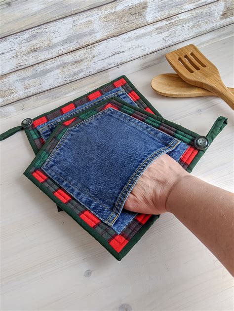Attach each pocket by sewing around the sides and bottom, using a 14 inch seam allowance. . Pocket pot holders